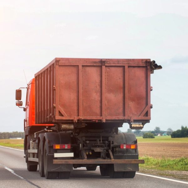 A,Truck,With,A,Detachable,Waste,Body,Drives,Along,A
